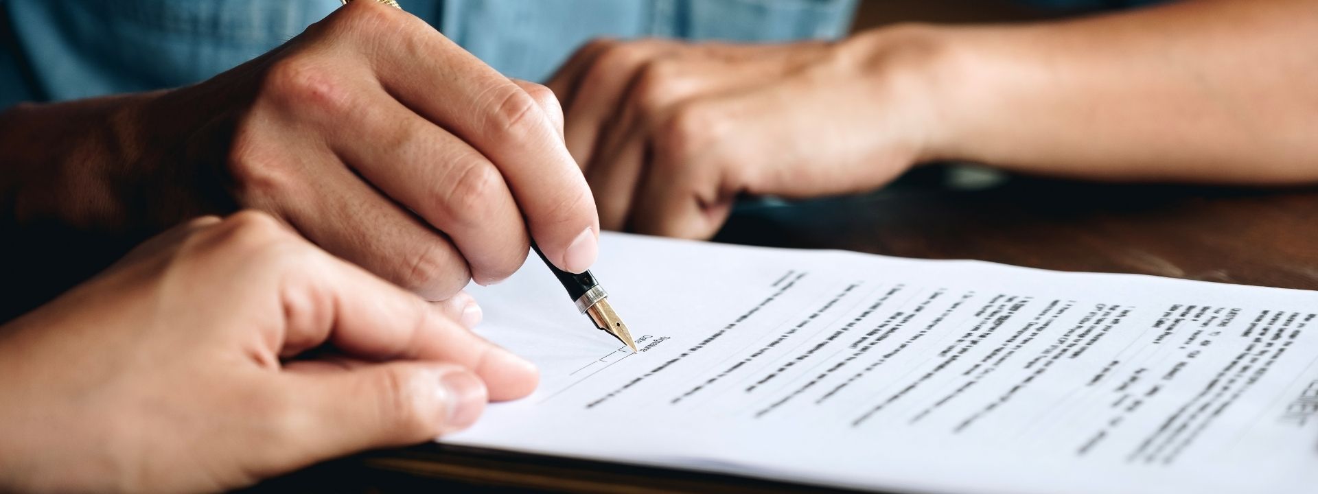 An employee filling a beneficiary designation