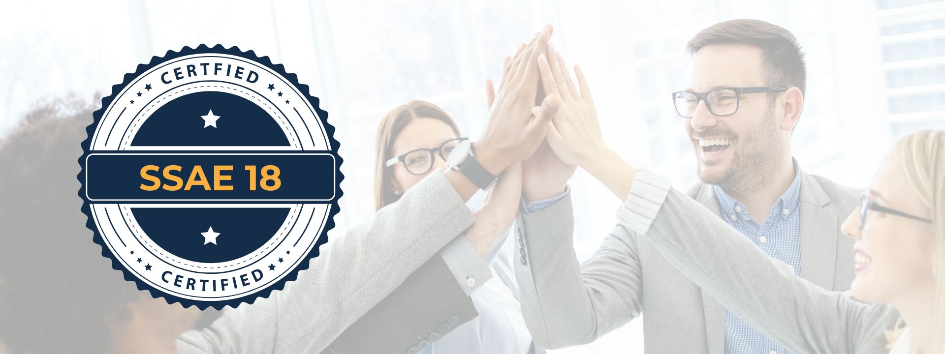 Team celebrating SSAE18 certification